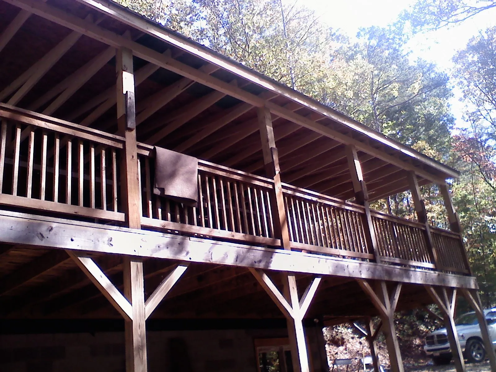Timber framing under a new elevated porch and deck — Roof Leak Repair in Hills by Roofing Brothers